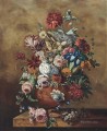 Rosas, claveles, loros, tulipanes campanillas y otras flores en una urna esculpida y un nido de huevos Jan van Huysum